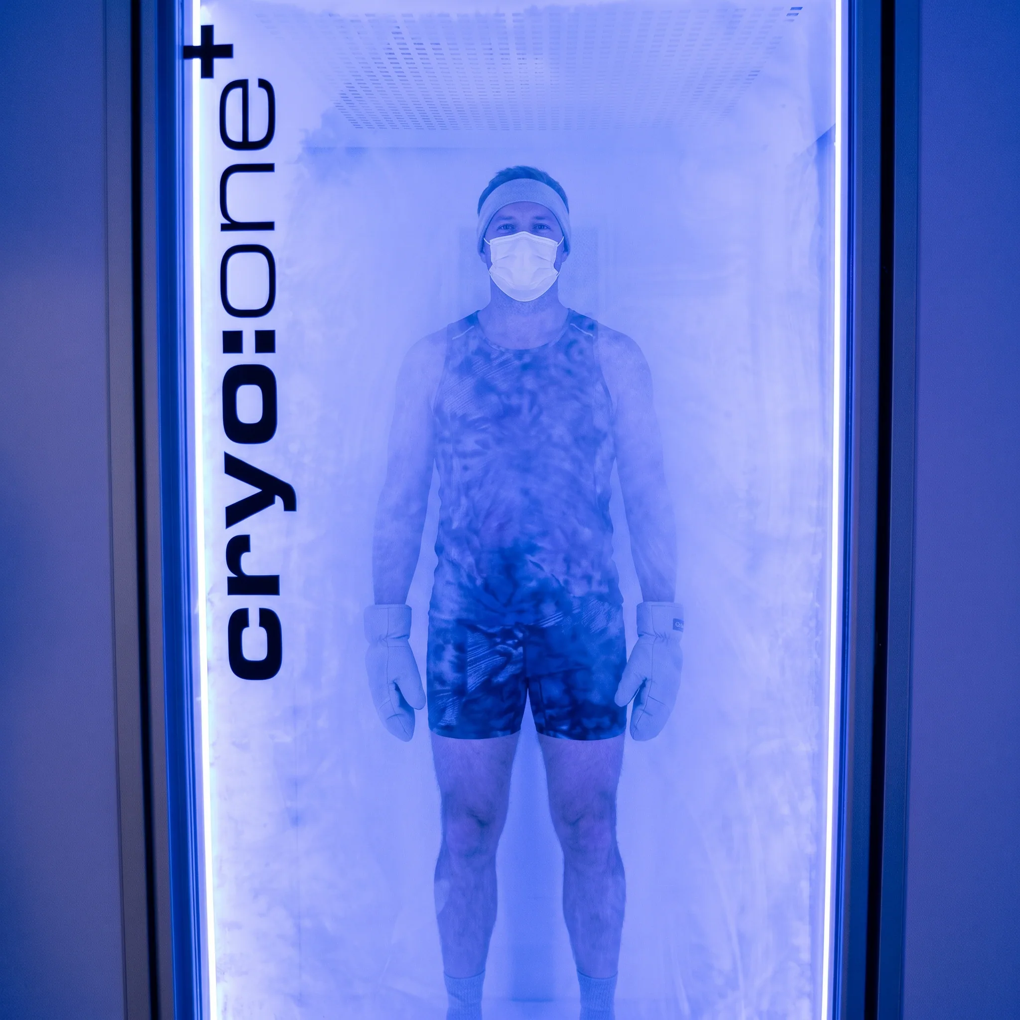 Man standing inside the cryotherapy chamber during cold exposure