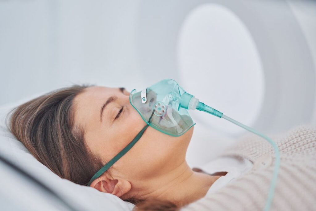 Patient relaxing during hyperbaric oxygen therapy. 